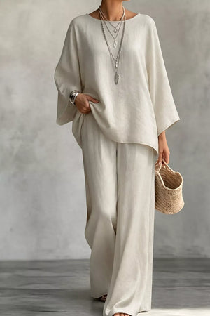 two-piece set in ivory featuring boat neck and relaxed fit