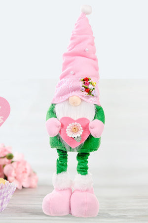 Embroidered gnome with pink heart accent, green body, pink hat, and pink boots.