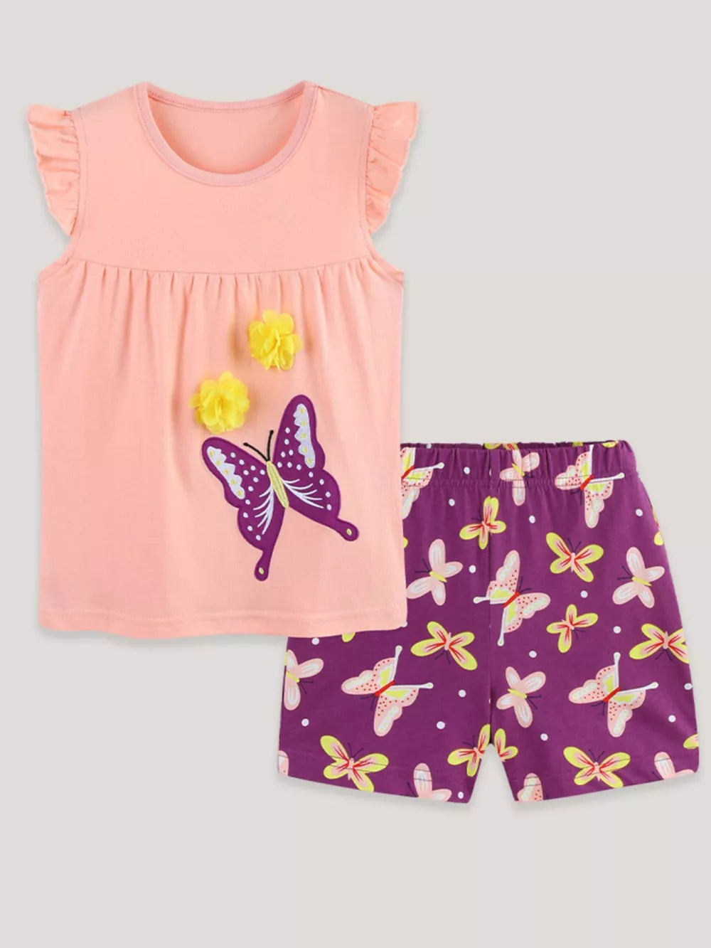 Peach cotton t-shirt with ruffle sleeves and butterfly applique, paired with purple butterfly print shorts.