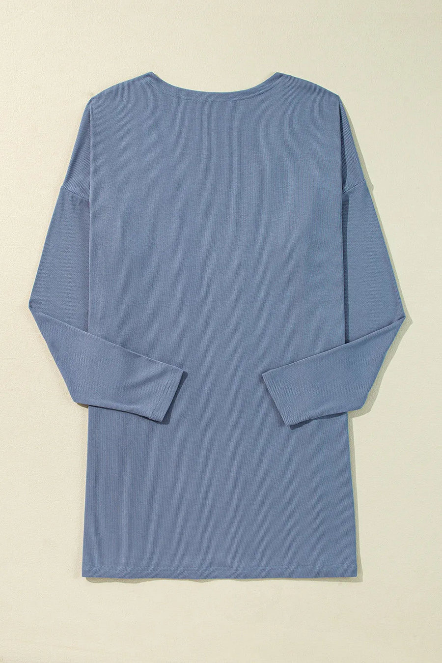Dusty blue ribbed knit long sleeve cardigan with a relaxed fit.