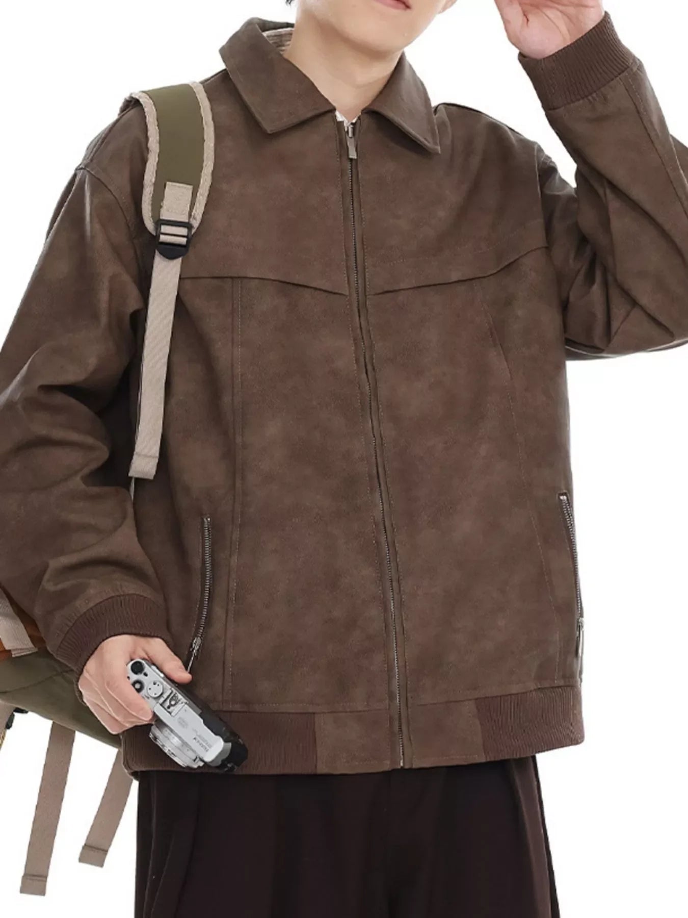 Brown drop shoulder bomber jacket with zip front and ribbed cuffs.
