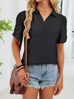 Black eyelet ruched short sleeve blouse with a collared V-neck