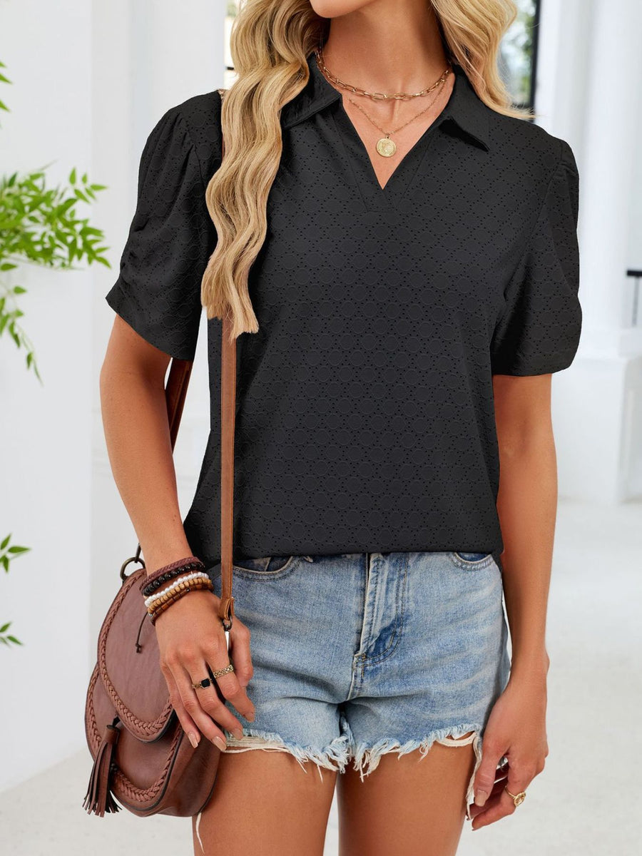 Black eyelet ruched short sleeve blouse with a collared V-neck