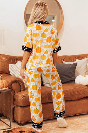 orange pajama set featuring buttoned and novelty print