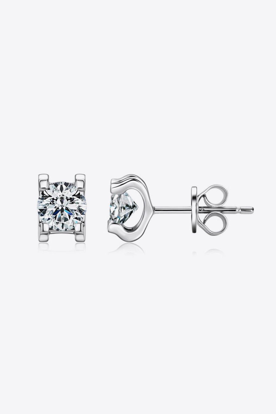 Silver moissanite solitaire stud earrings with classic prong setting.