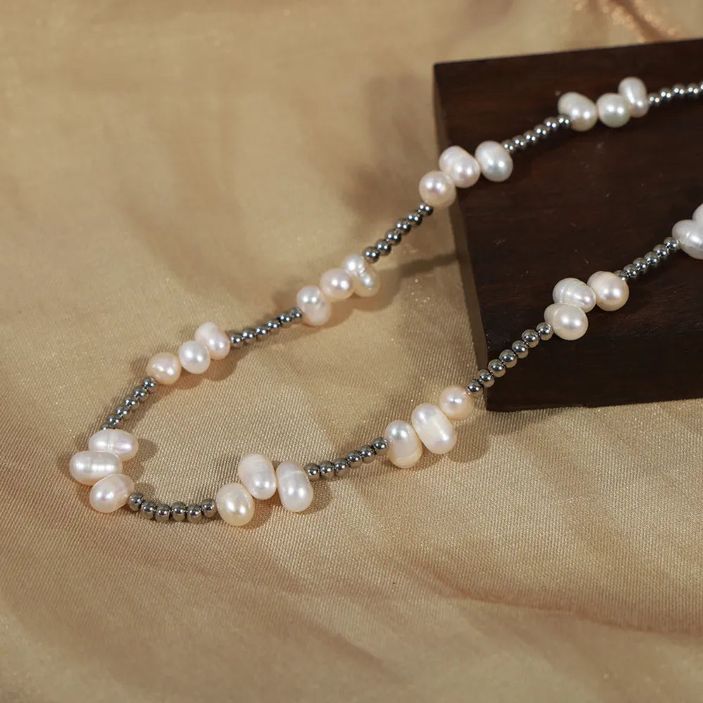 Silver irregular pearl cluster necklace with small metallic beads