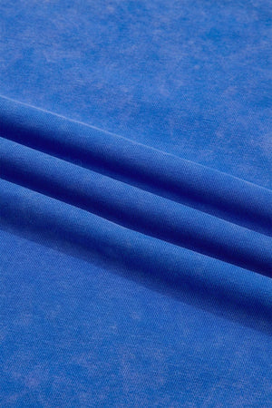 Blue cotton t-shirt with a washed effect and ribbed texture detail.