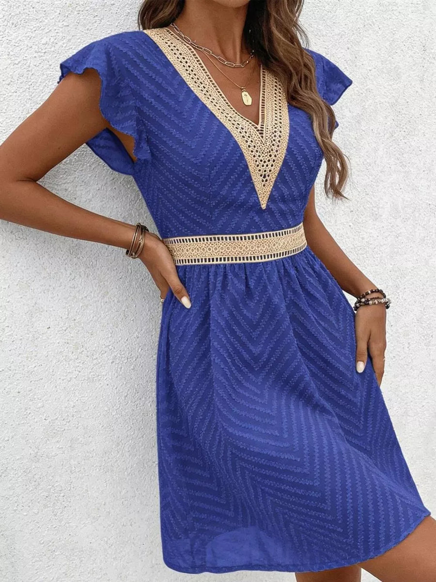 Royal blue chevron textured V-neck mini dress with lace trim and defined waist