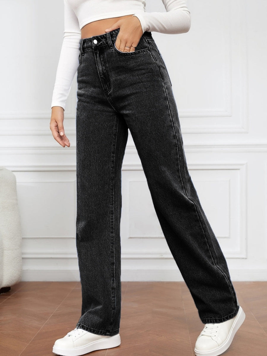 Black wide-leg denim jeans with a sculpted high rise, shown on a model.