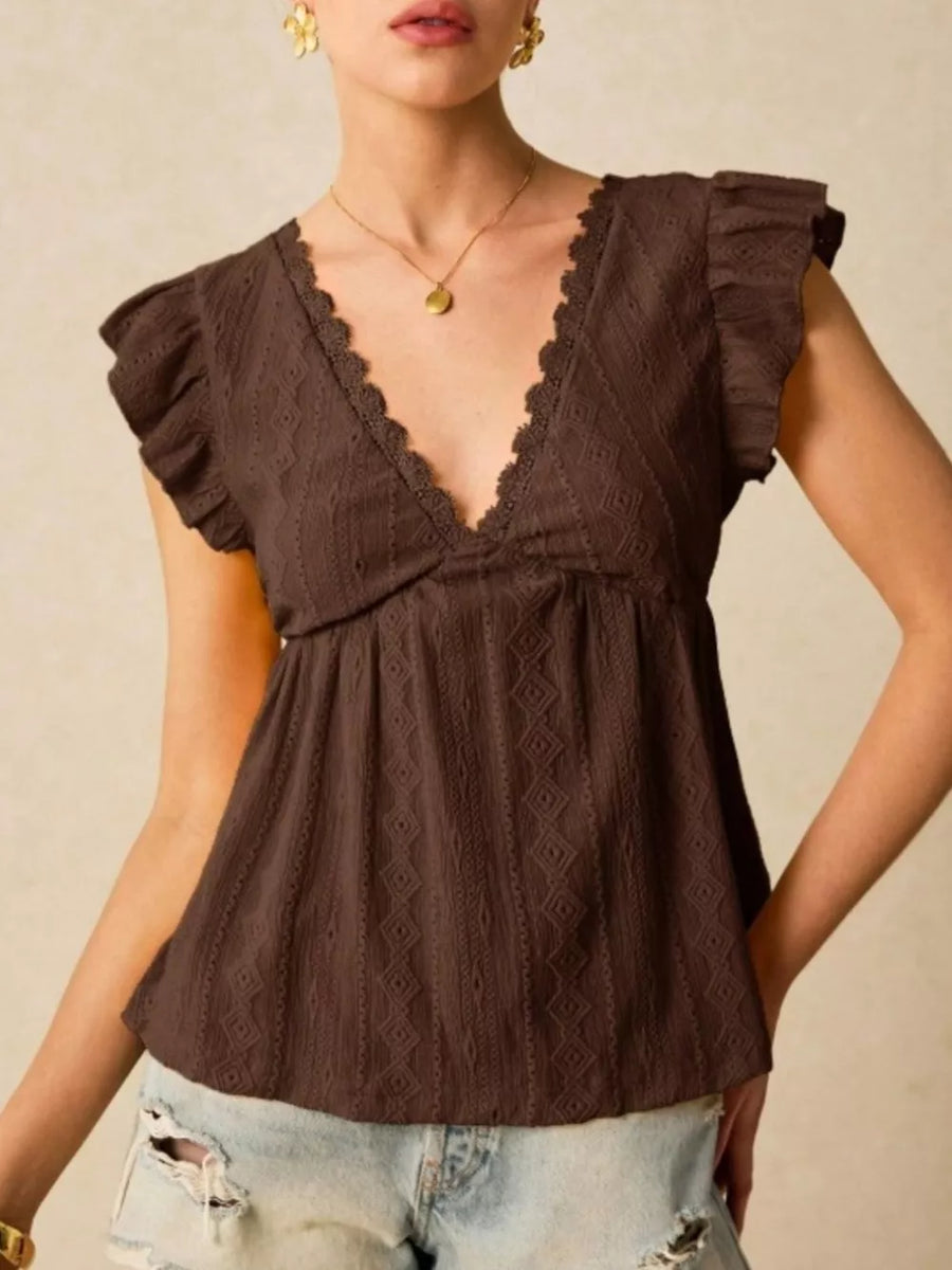 Brown eyelet blouse with lace trim and ruffle sleeves, V-neck.
