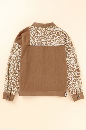 Camel corduroy jacket with leopard print panels on sleeves and yoke, buttoned cuffs.