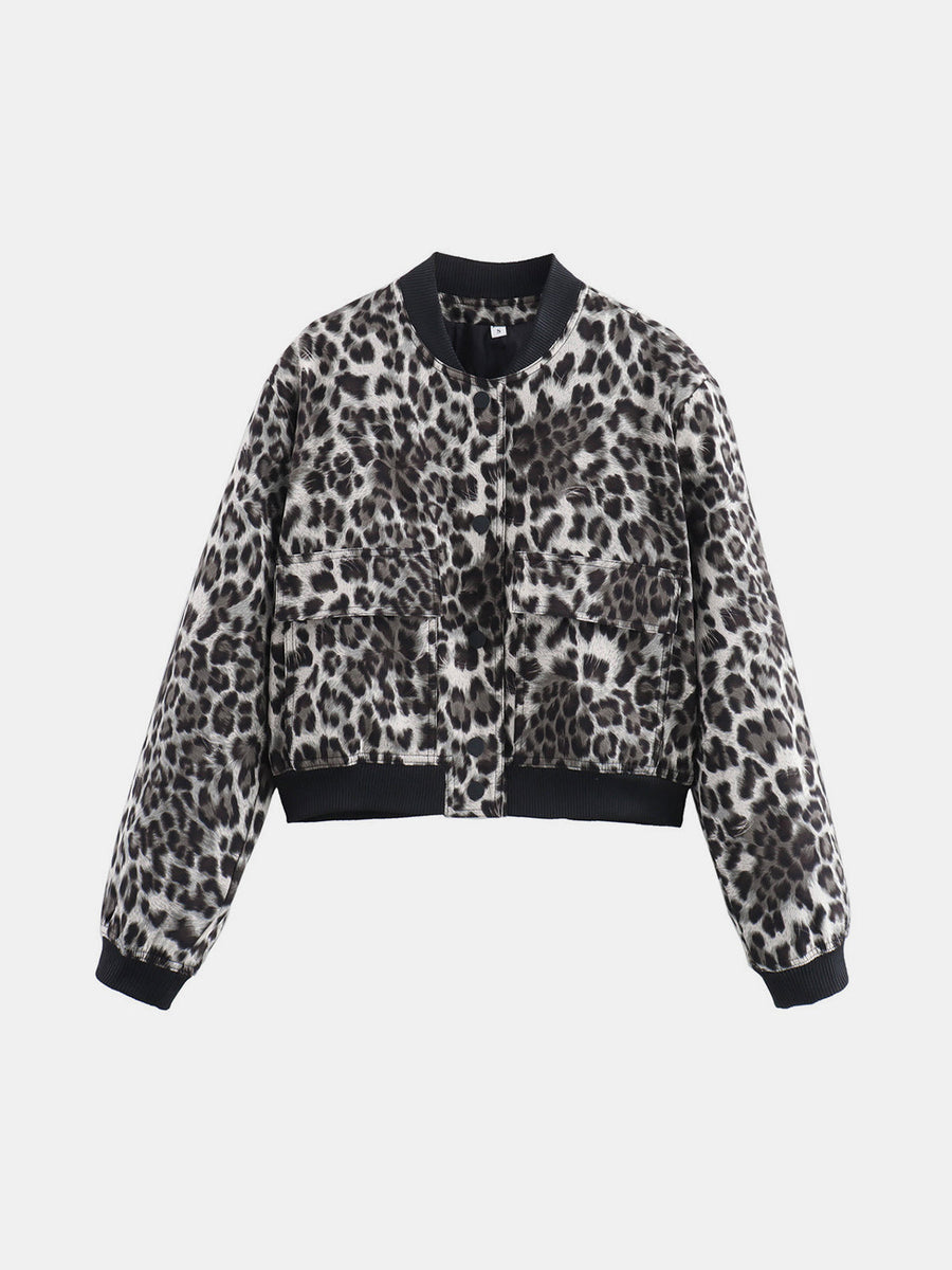 Boxy bomber jacket in leopard print with black trim and two front pockets.
