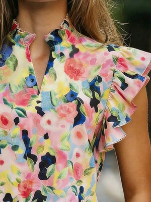 Floral print t-shirt with ruffled collar and sleeves in a multicolor abstract floral pattern.