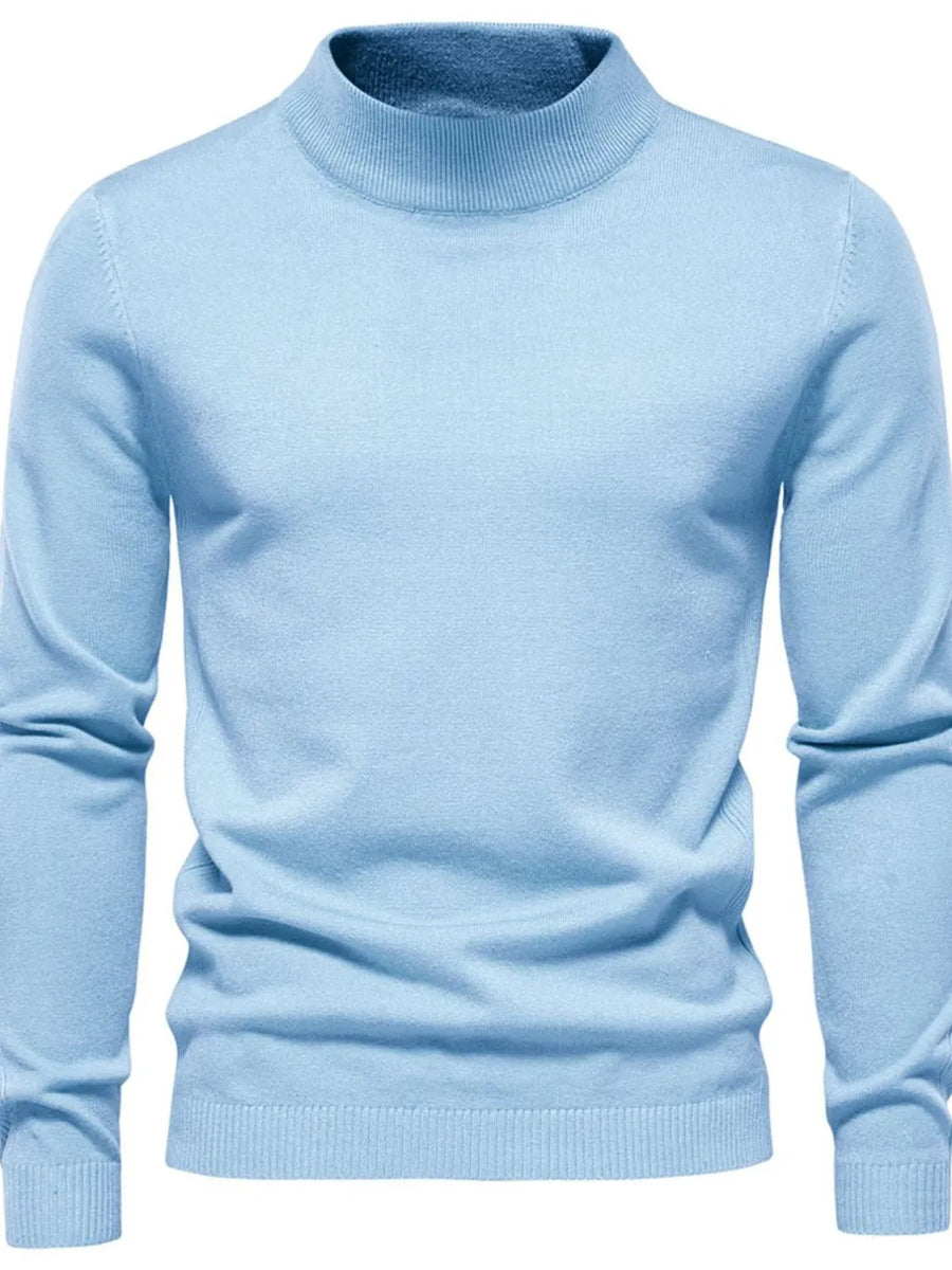 Light blue ribbed mock neck sweater with long sleeves and a classic fit.