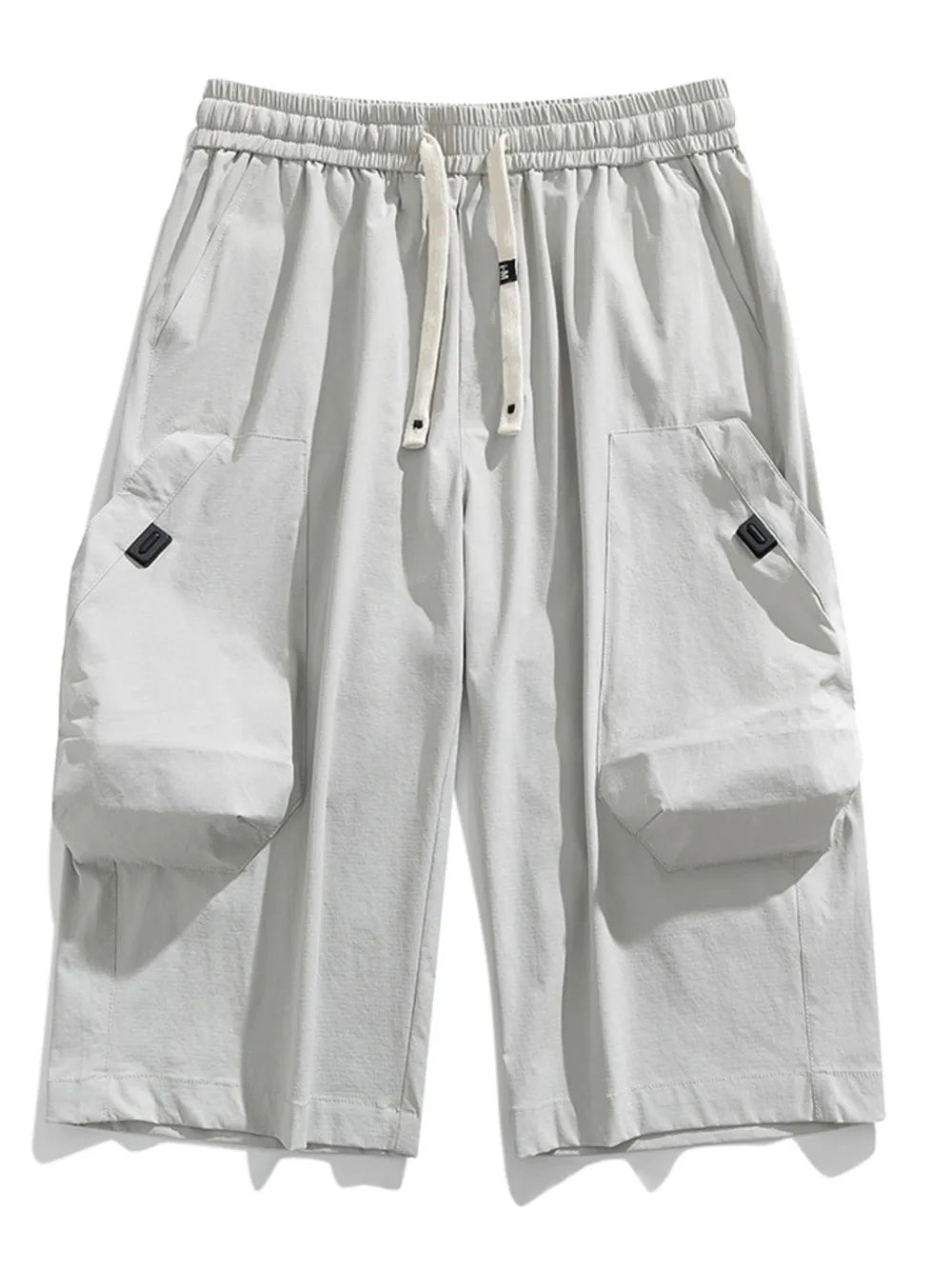 Light Gray cargo capris with adjustable drawstring and large side pockets.