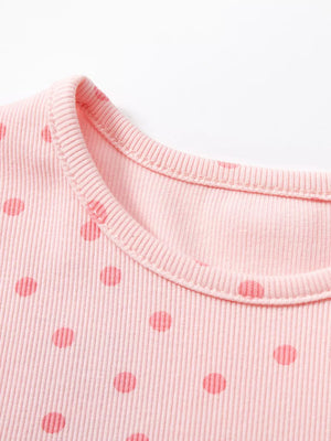 Pink ribbed cotton toddler dress with red polka dots and crew neck detail.