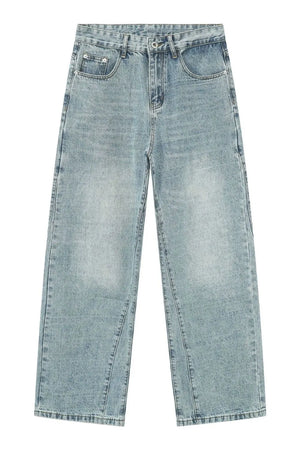 Wide-leg denim jeans in medium wash with subtle seam detail on the legs.