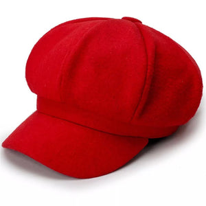 Bright red polyester beret with a classic shape and visor.