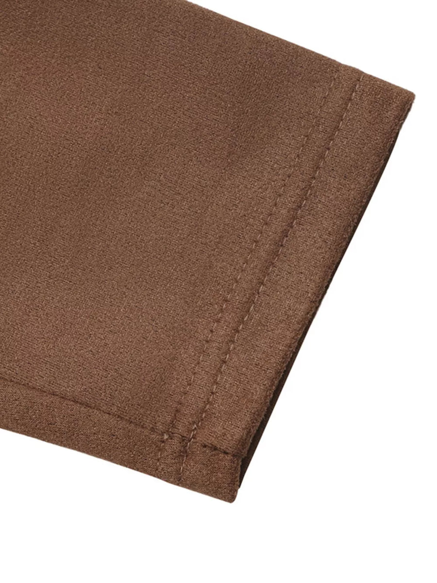 Brown long sleeve top with textured fabric and visible stitching detail.