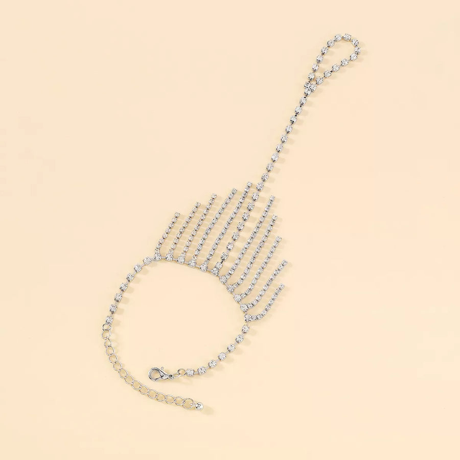 Rhinestone fringe hand chain bracelet with adjustable clasp and extender.