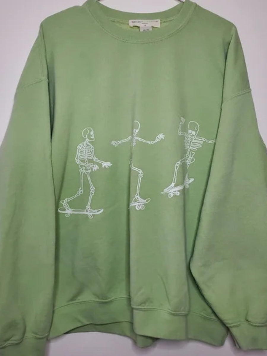 100% polyester Care instructions: Machine wash cold sweatshirt in Light Green with oversized silhouette