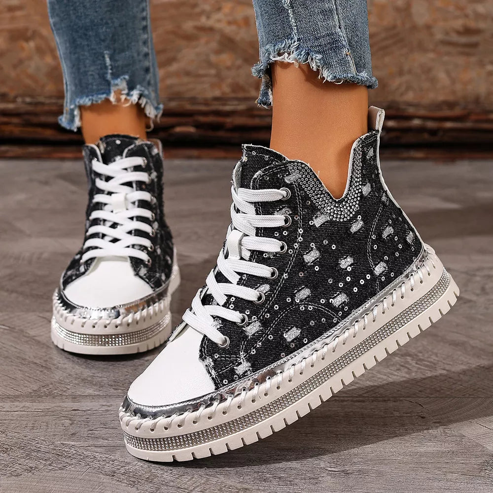 Black canvas high-top sneakers with rhinestone embellishments and white laces.