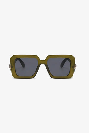 Moss geometric facet sunglasses with embellished temples and dark lenses.