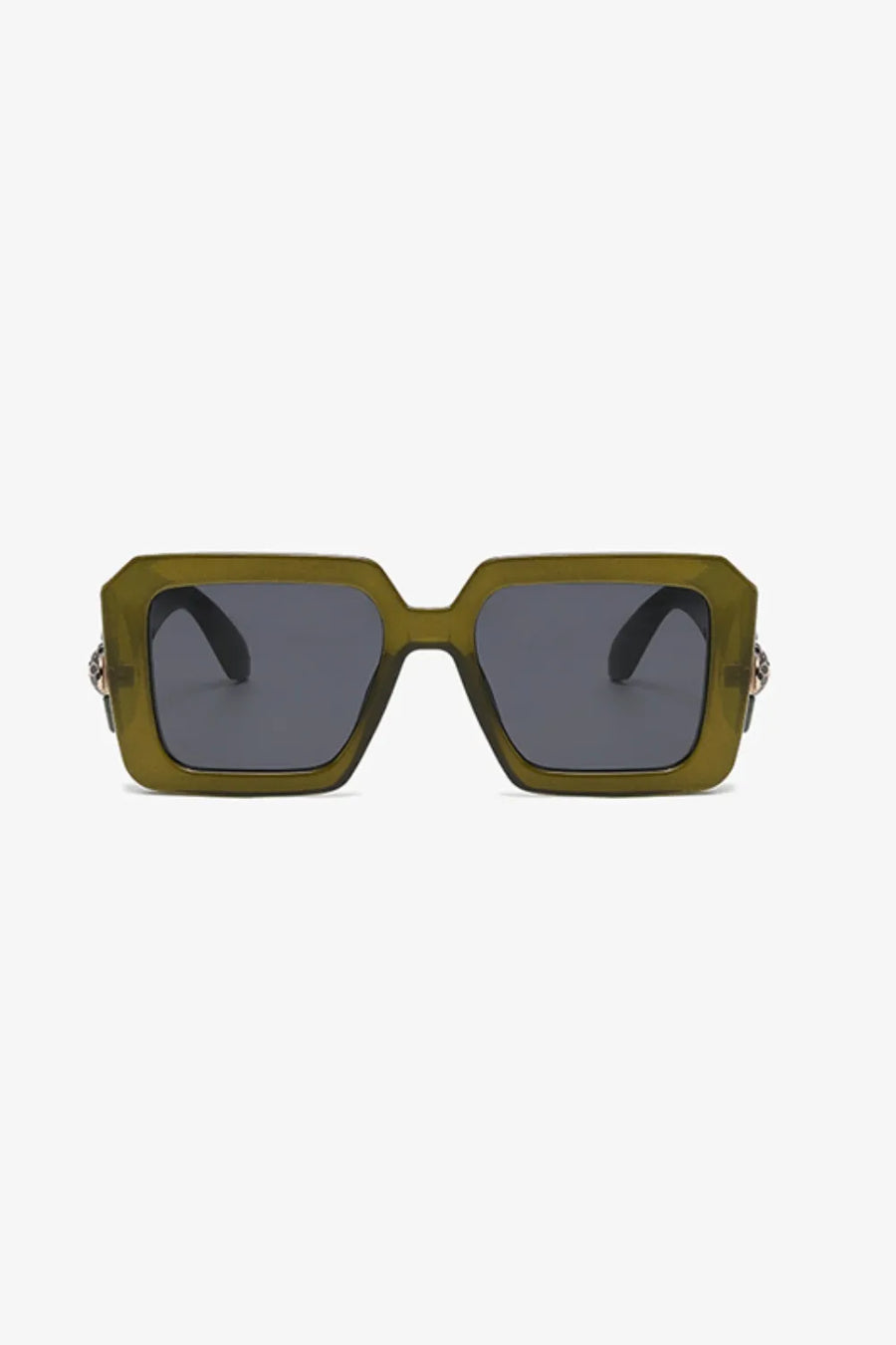 Moss geometric facet sunglasses with embellished temples and dark lenses.