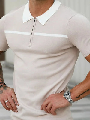 Men's beige knit zip-neck polo with contrast white stripe detail and white collar.