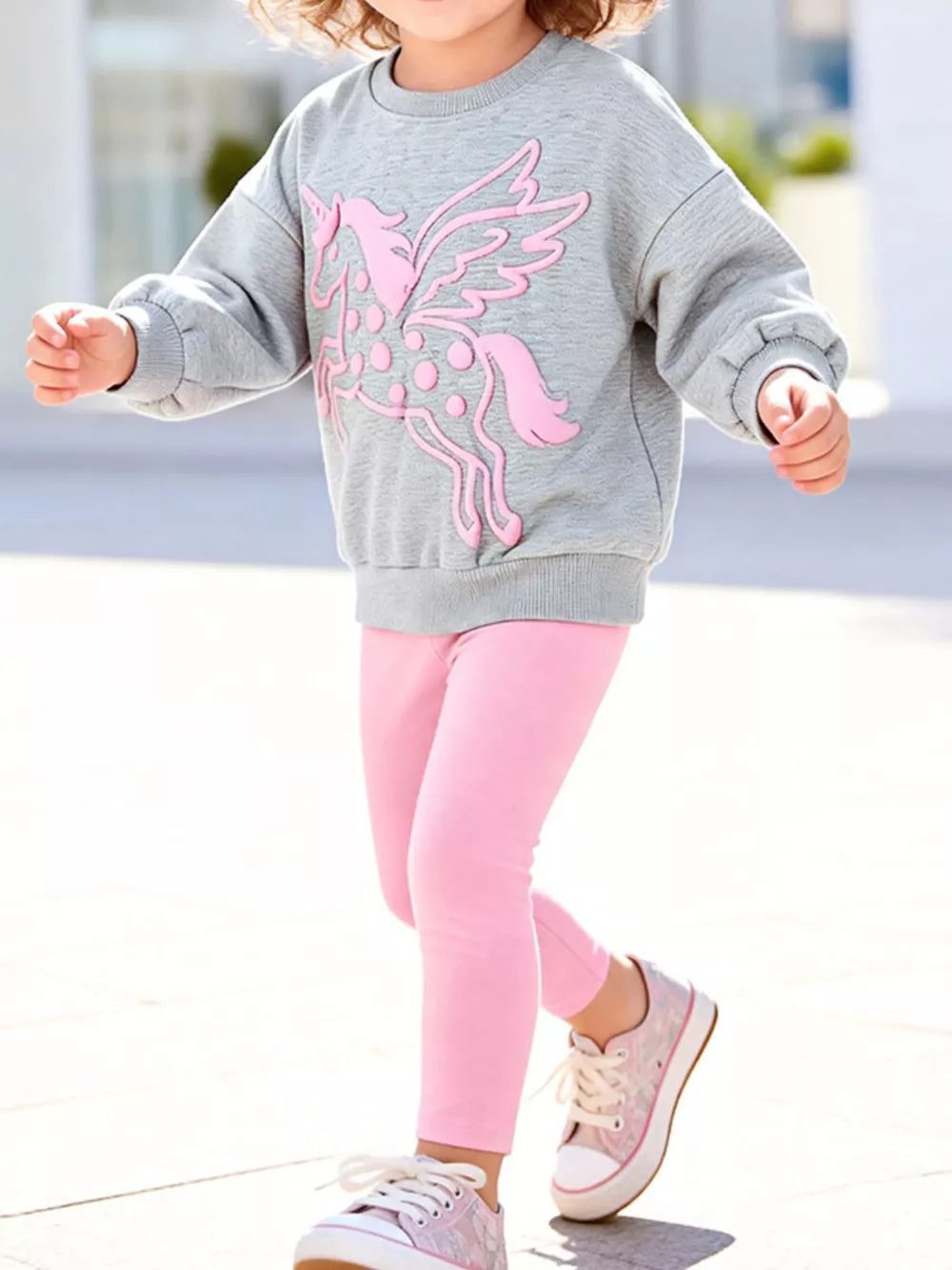 light gray sweatshirt and leggings set with graphic print and crew neck
