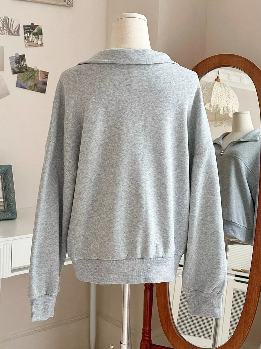 65% polyester, 30% viscose, 5% elastane Care instructions: Machine wash cold sweatshirt in Light Gray with relaxed silhouette