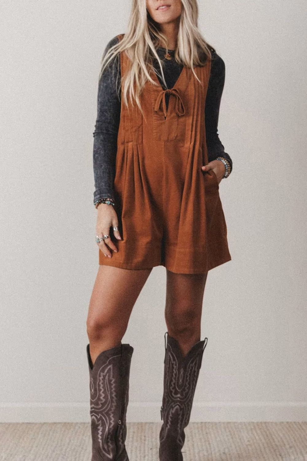 romper in rust featuring tied and relaxed fit