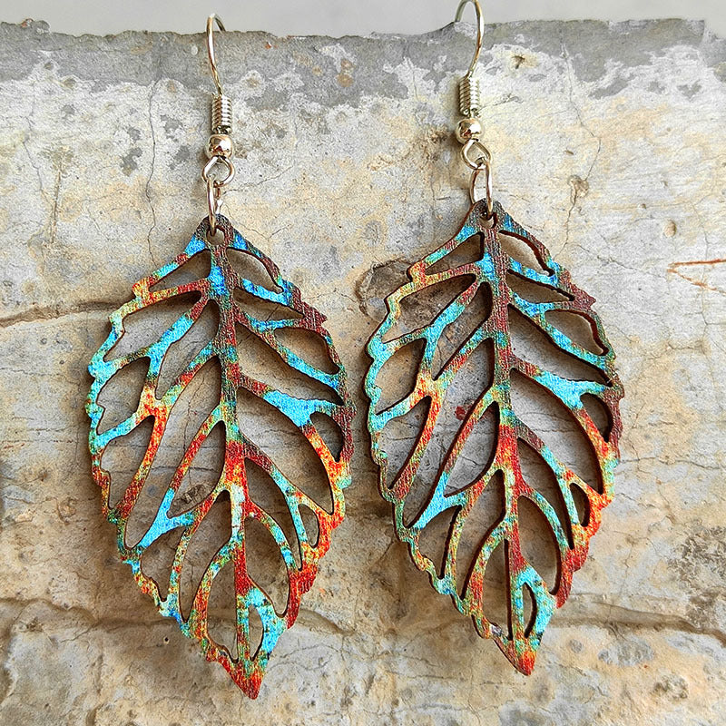 Patina leaf laser-cut drop earrings with rustic blue and red distressed finish