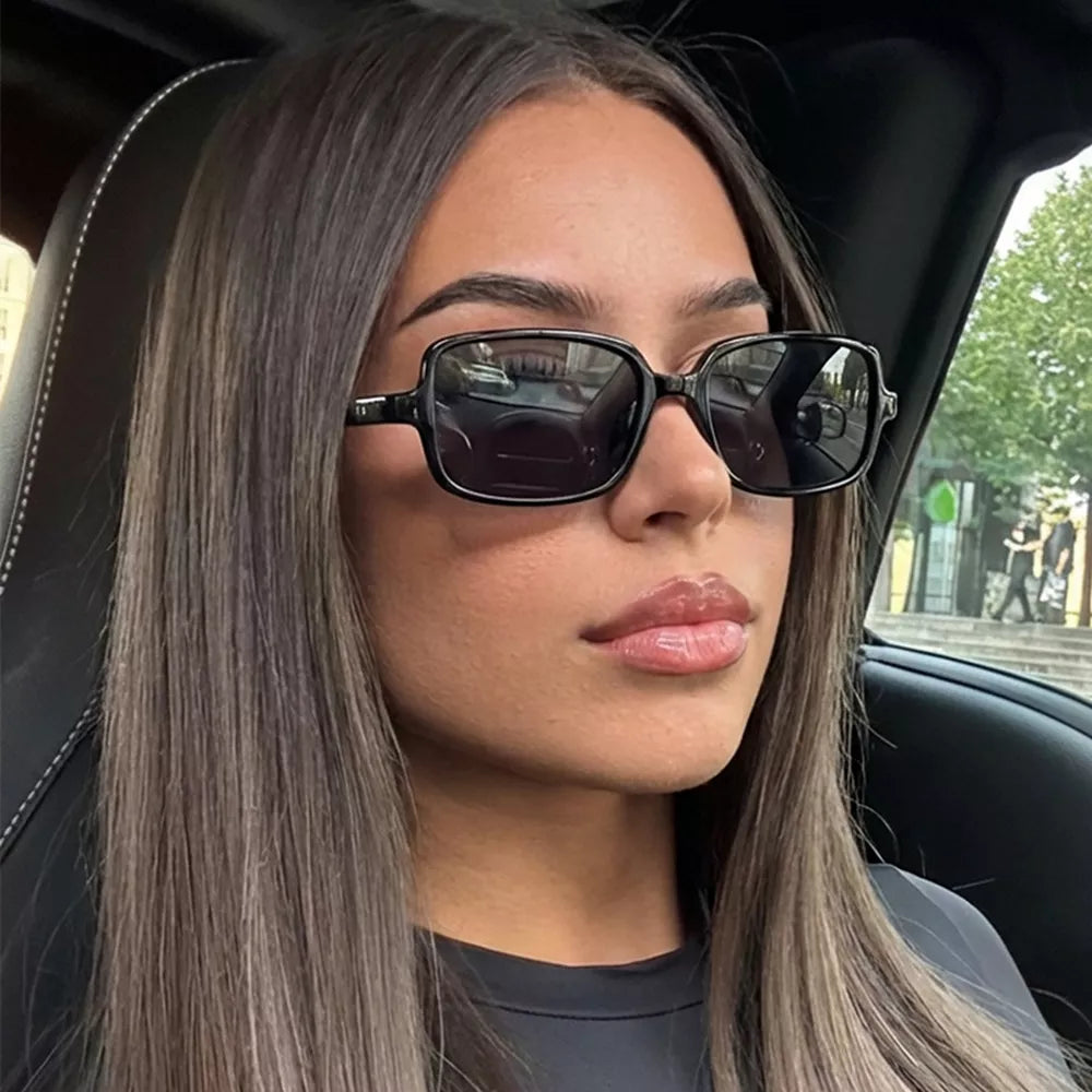 sunglasses in black featuring UV protection and square fit