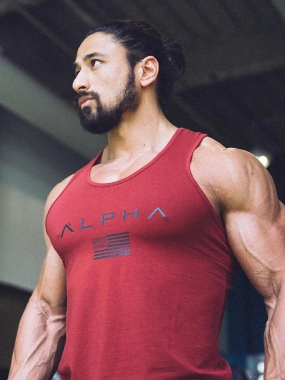 Burgundy Alpha graphic muscle tank top with American flag detail.