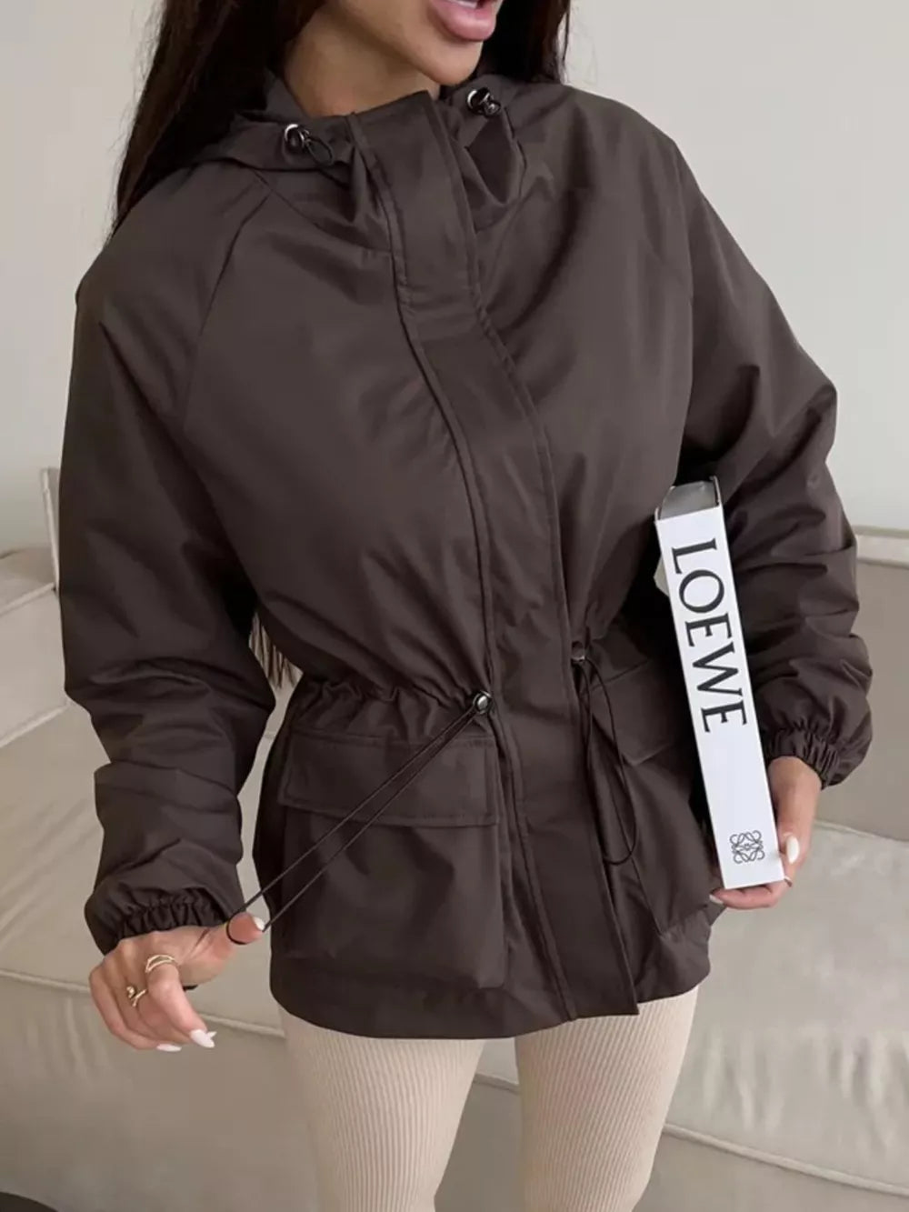 100% polyester Care instructions: Machine wash cold windbreaker in Wine Red with relaxed silhouette