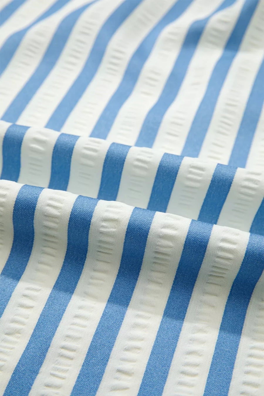 Classic striped collared blouse in blue and white textured cotton fabric