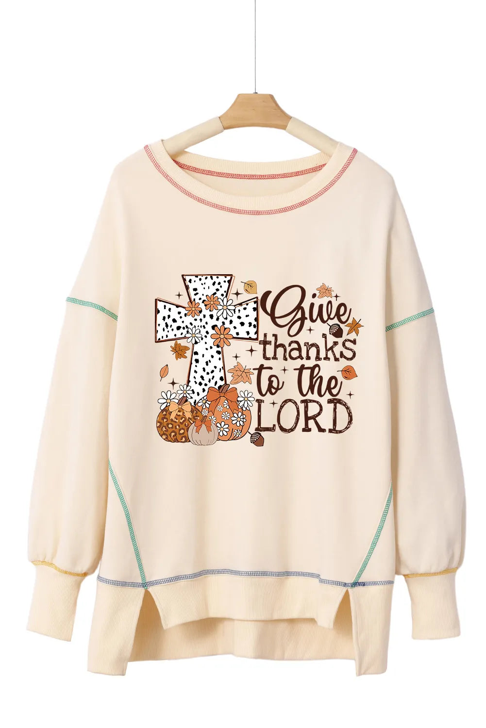 Beige graphic cross stitch sweatshirt with fall print and text.