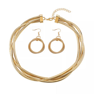 jewelry set in gold with multi-layered and choker length
