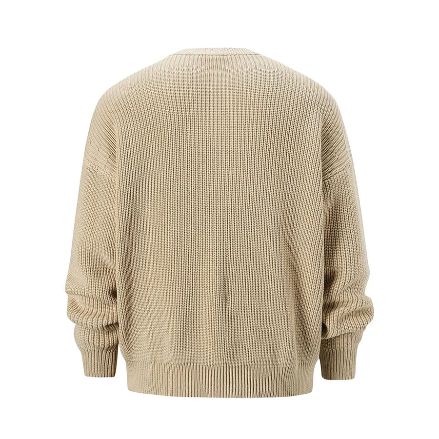 Khaki ribbed knit oversized sweater with crew neck and long sleeves.