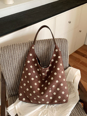 handbag featuring polka-dot in Black with Suede Imported Size &amp texture