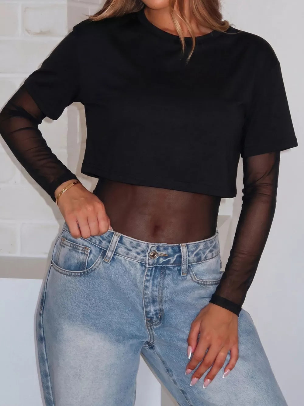 95% polyester, 5% elastane Care instructions: Machine wash cold bodysuit in Black with fitted silhouette