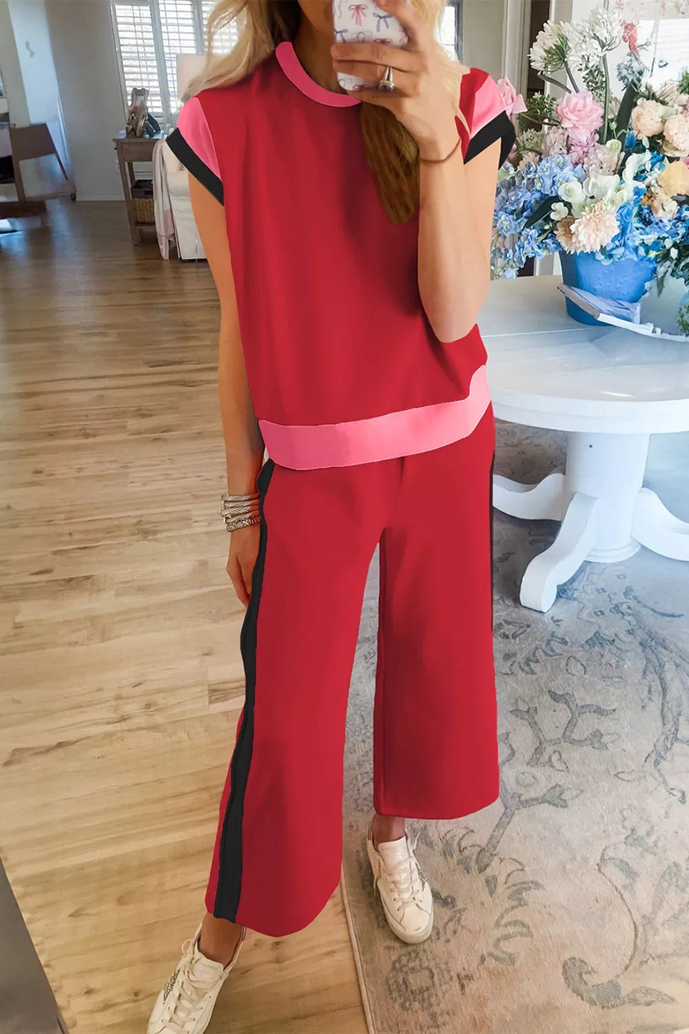 Red two-piece tee and wide-leg pants set with pink and black accents, crew neck, short sleeves