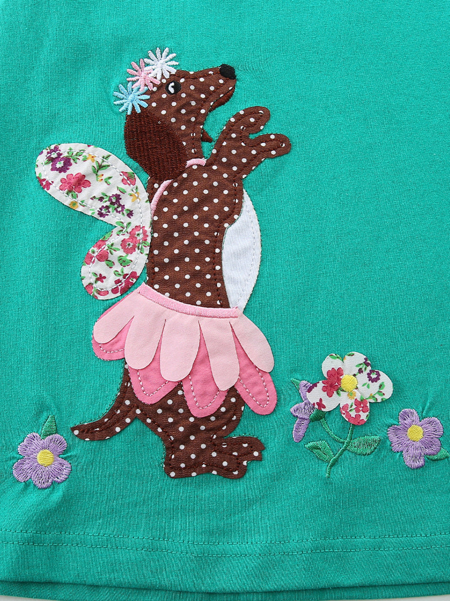 Toddler dress with embroidered brown polka dot dog design, floral wings, and pink petal skirt.