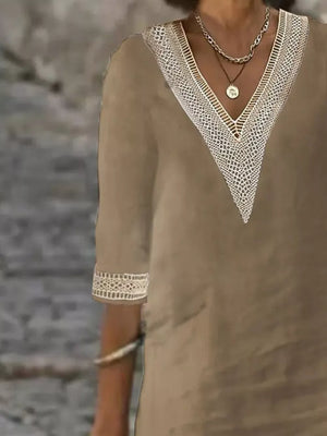 white relaxed midi dress with v-neck