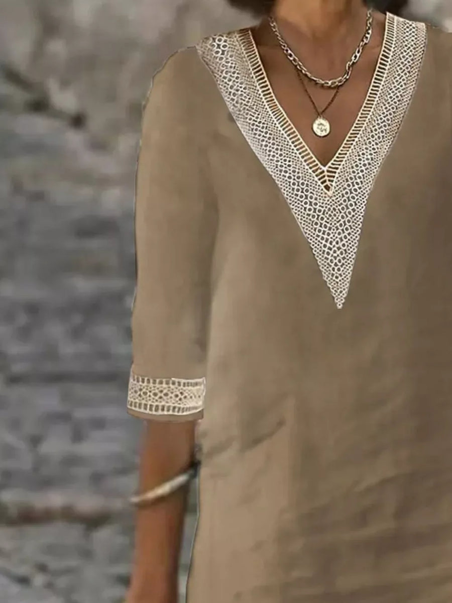 white relaxed midi dress with v-neck