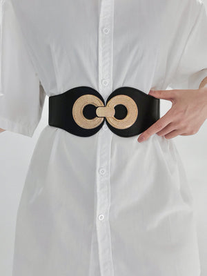 Black cincher belt with gold interlocking circles detail.