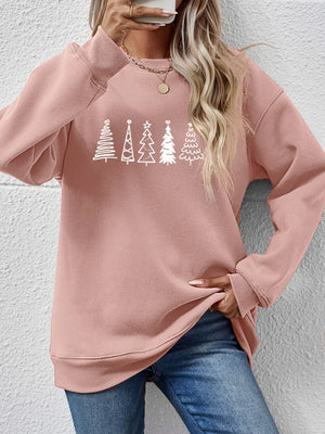 Blush pink oversized sweatshirt with a white festive tree line graphic, crewneck, and long sleeves.