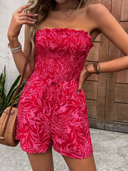 Smocked bandeau romper in strawberry leaf print with tie waist detail