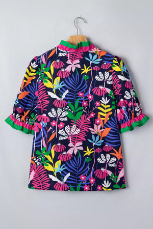 Cotton floral print blouse with frill neckline and cuffs.